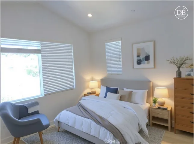 Primary Bedroom w/vaulted ceilings - staged