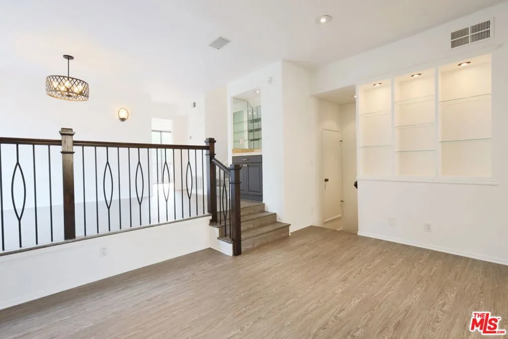 New Floors & Iron Railing