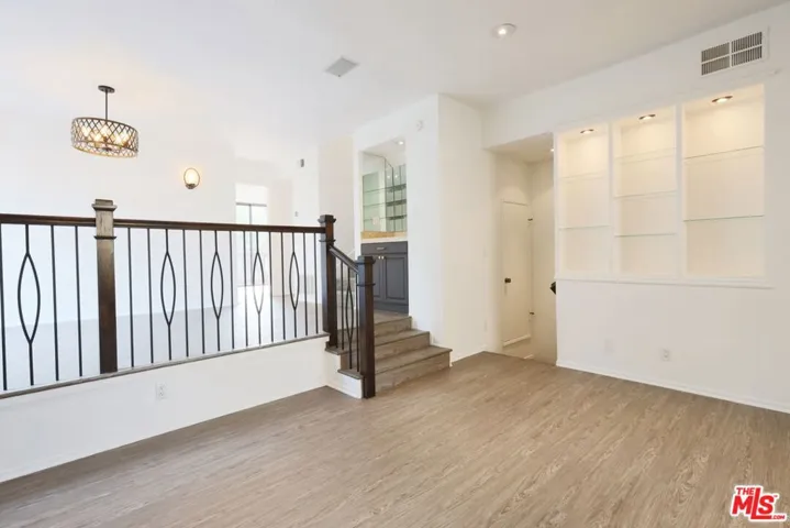 New Floors & Iron Railing