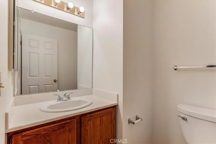Upstairs 1/2 bath (toilet, sink)