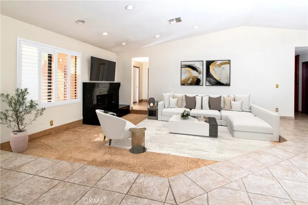 Photo is digitally altered to show perspective with furniture. Previous photo is the original.