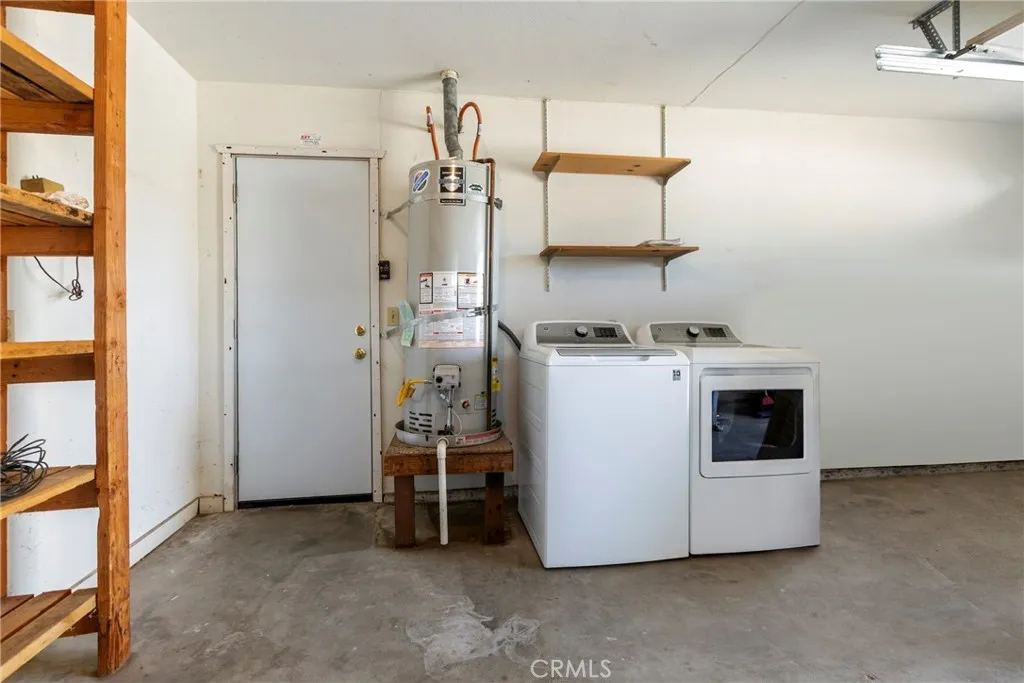 Washer, dryer, water heater in garage