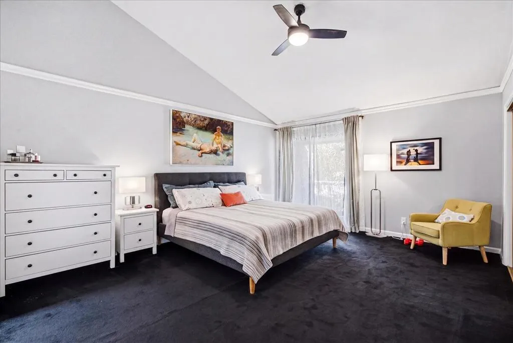 Primary bedroom with private balcony