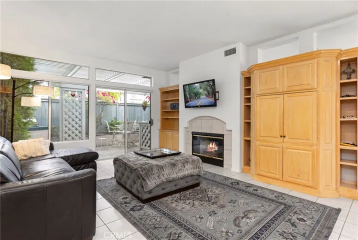 Family room with Build in and Fire plece