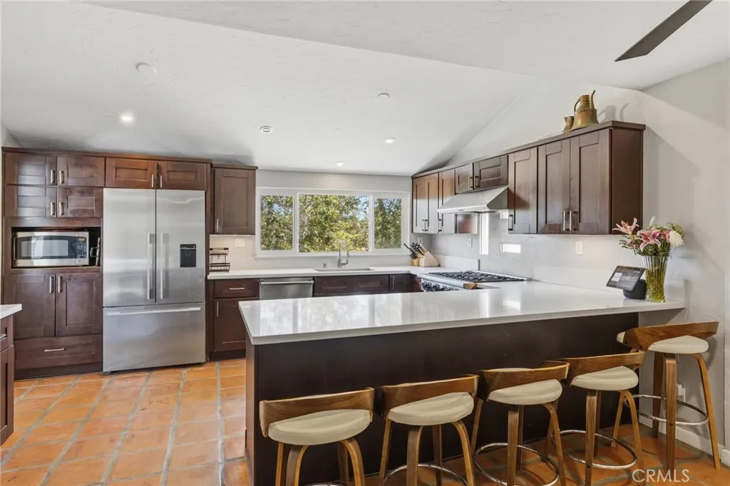 Open kitchen with tennis court views