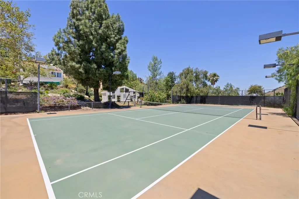 Tennis court view to guest house, and house
