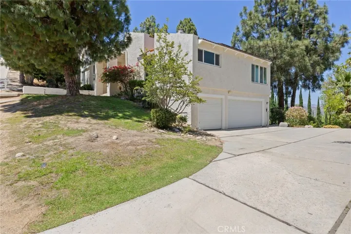 Driveway + 3 car garage