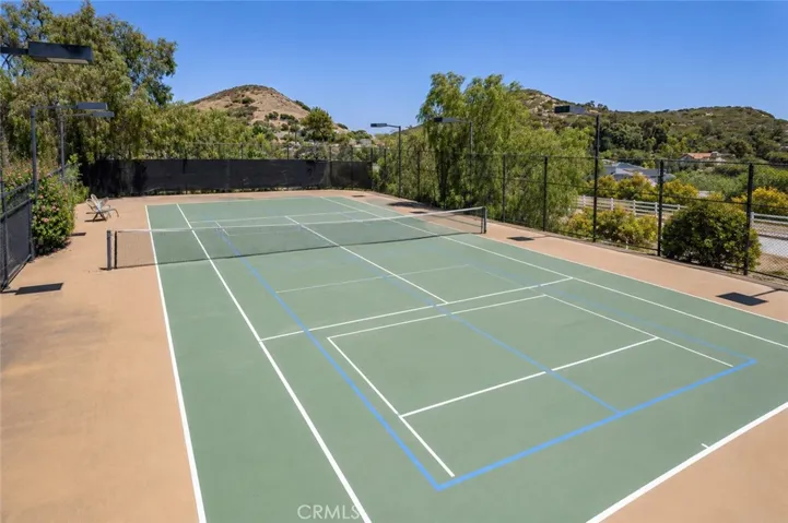Tennis court that can be used as a pickleball court as well.