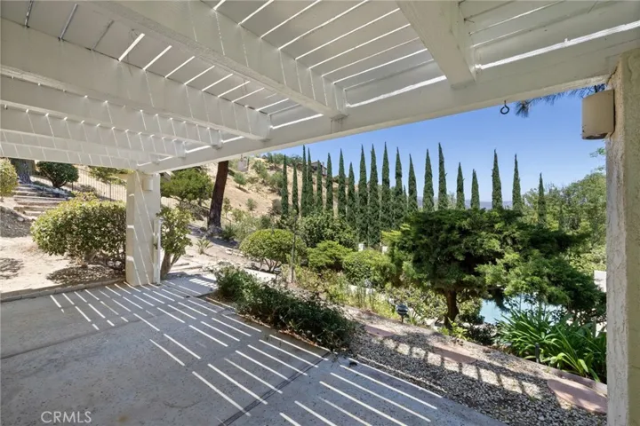 Back door that leads to this patio, and pool area. Great for relaxing, and enjoying the view.