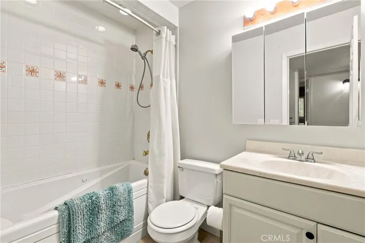 The main bathroom offers tile floors and an extra deep, jetted tub/shower combination.