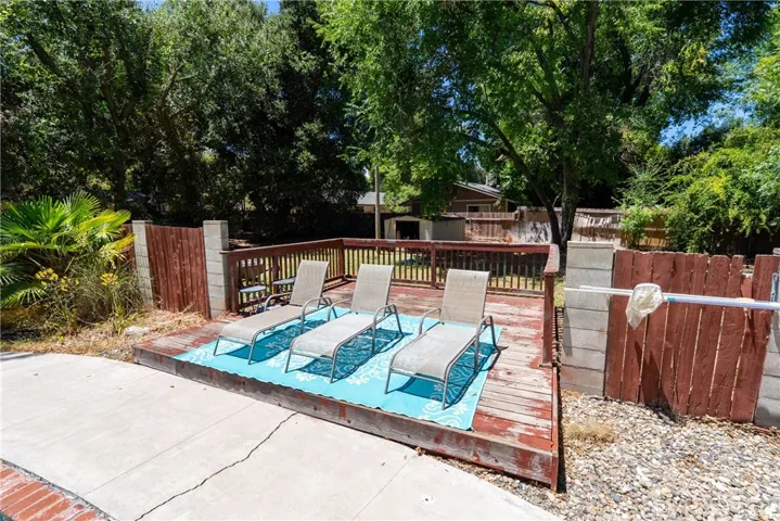 Lounge poolside on the deck, thoughtfully designed with ample room for chaise chairs and sunbathing.