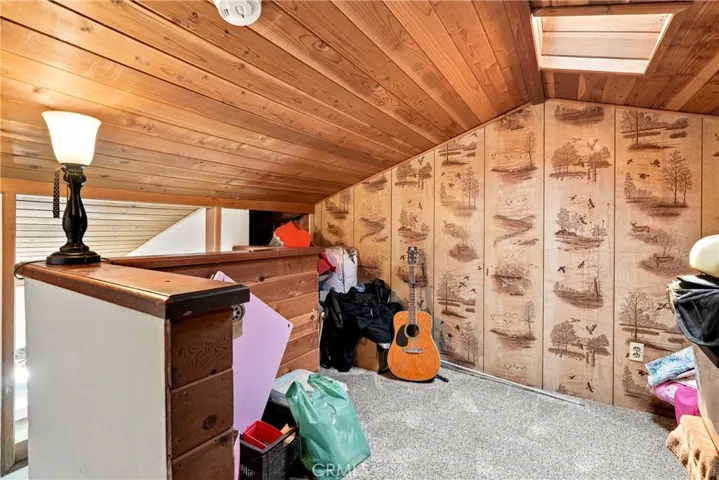 At the top of the stairs there is a loft area that could function as a home office, craft room, play room or whatever your needs may be.