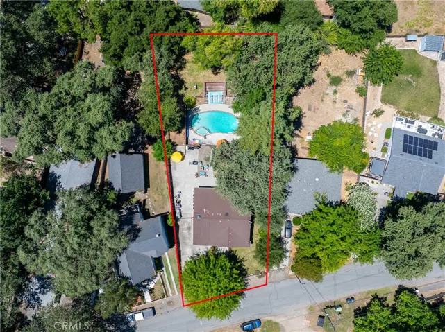 The home sits on ~ 0.26 acres. Property lines are approximate.