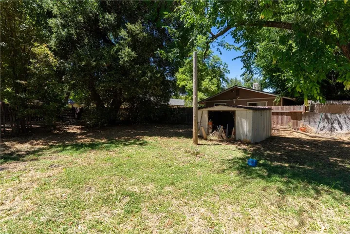A separately fenced lawn at the back of the property provides a versatile space for recreation, pets, or future possibilities.