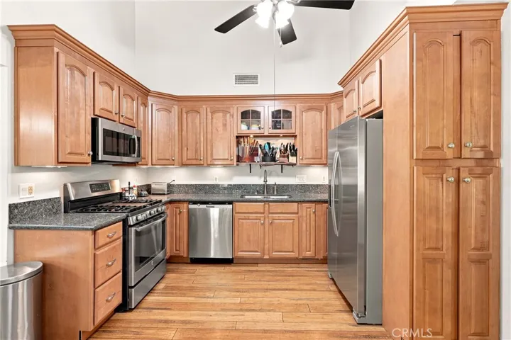 The updated kitchen has plenty of cabinetry for storage.