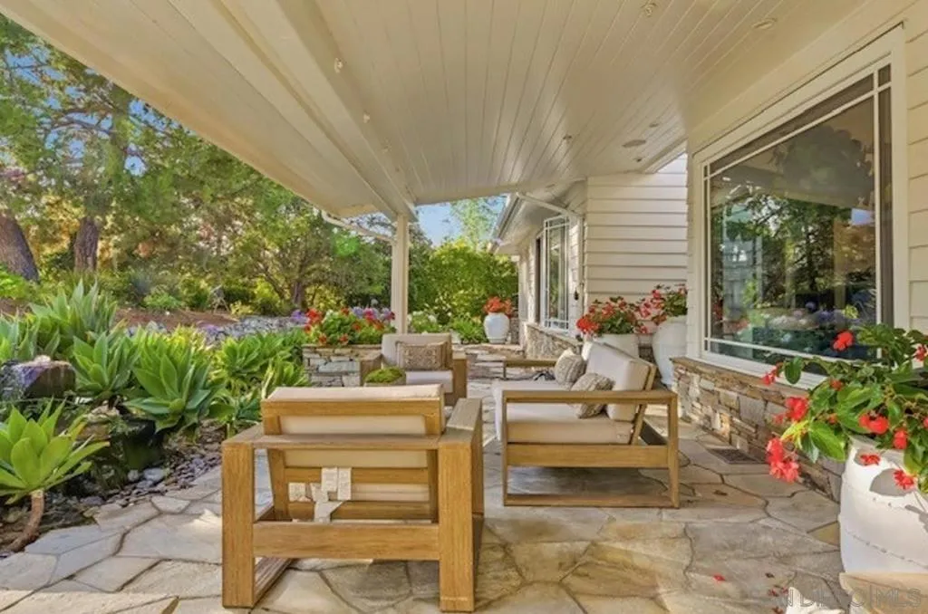 Front porch. Perfect place to enjoy coffee in the morning and listen to birds sing.