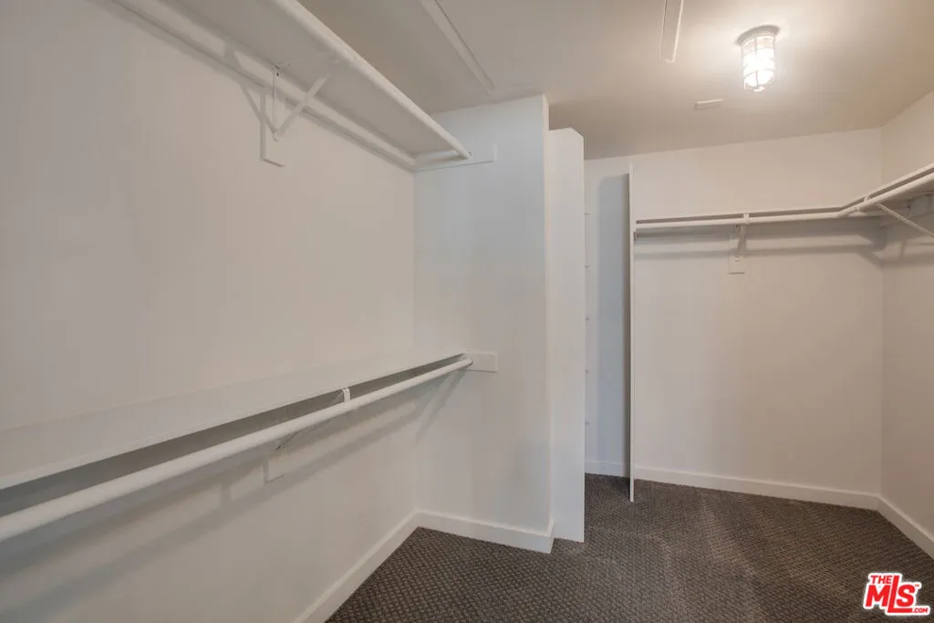 PRIMARY BED WALK IN CLOSET