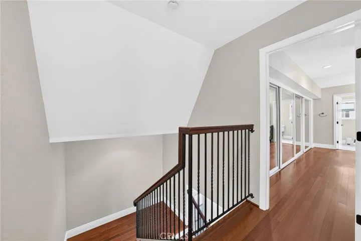 Access to primary suite as you come up the stairs.