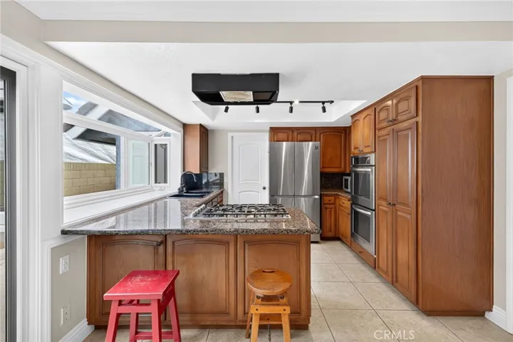 Sitting peninsula and large bay window makes for great natural light.