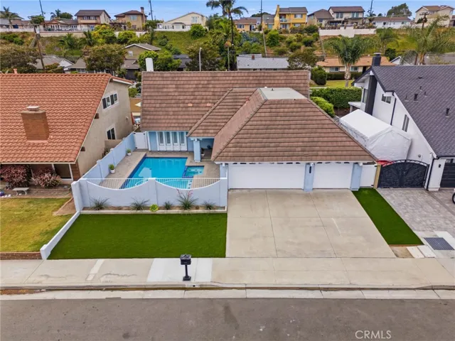 Another exterior angle showcasing the home’s spacious two-story design.