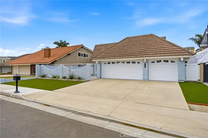 Pleasant curb appeal with refreshed exterior and a 3-car driveway for cars & toys