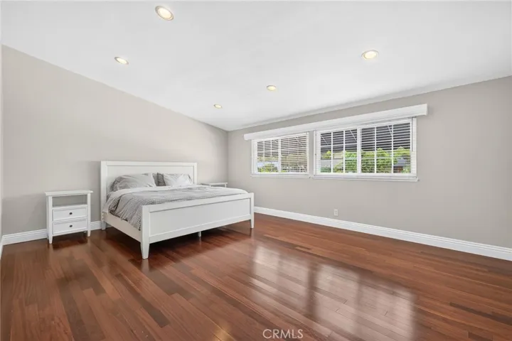 Primary Bed BEFORE virtual staging.