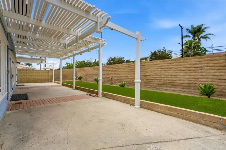 Large covered patio providing lots of outdoor space in a private setting.