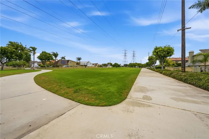 Nearby greenbelt offers open space for walking, recreation, and outdoor enjoyment.