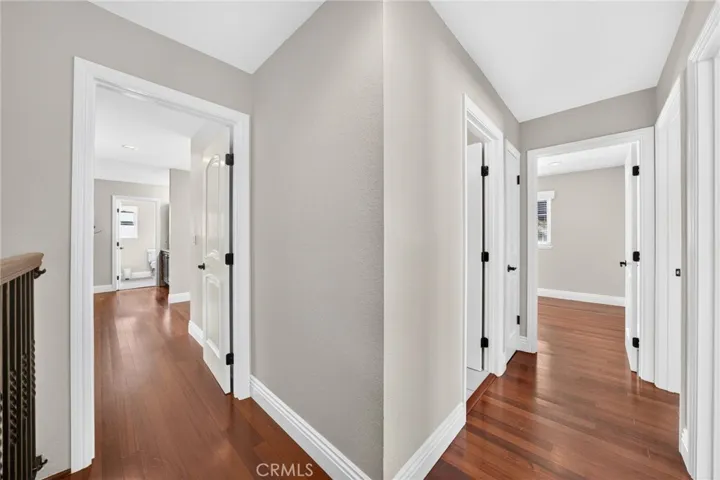 Hallway provides convenient access to the home's bedrooms and​​‌​​​​‌​​‌‌​​‌​​​‌‌​​​‌​​‌‌​​‌‌​​‌‌​​​​ bathrooms.
