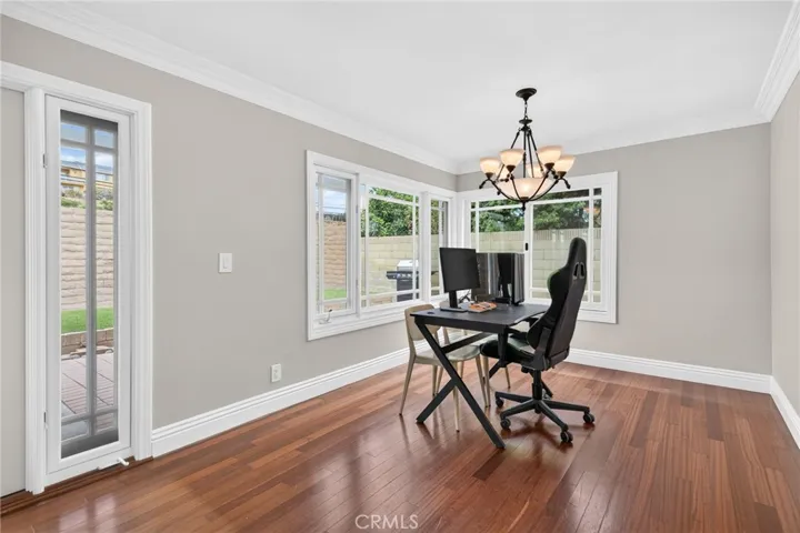 Dining space positioned between the living room and kitchen.