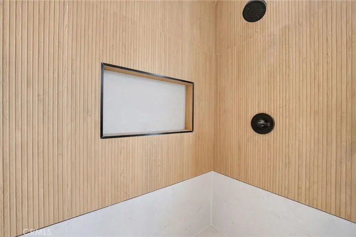 En-suite bathroom offers a refreshed design and practical layout.

