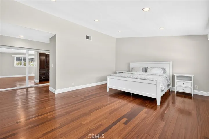 Another angle highlighting the size and functionality of the primary bedroom.
