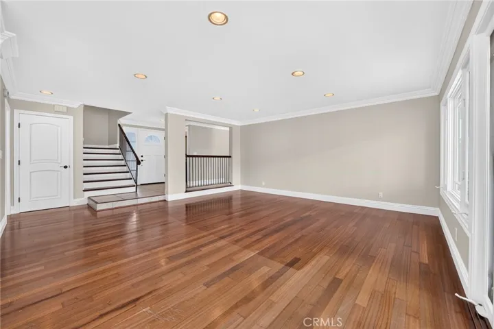 Hardwood flooring extends throughout the main living areas.
