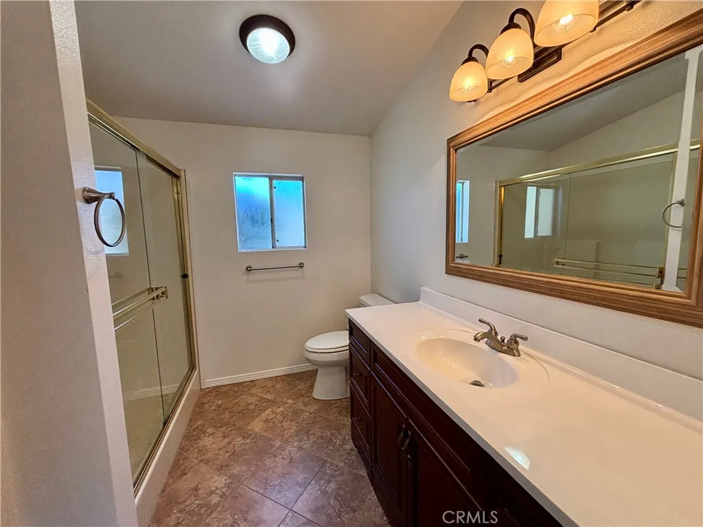 Primary bath has walk-in shower