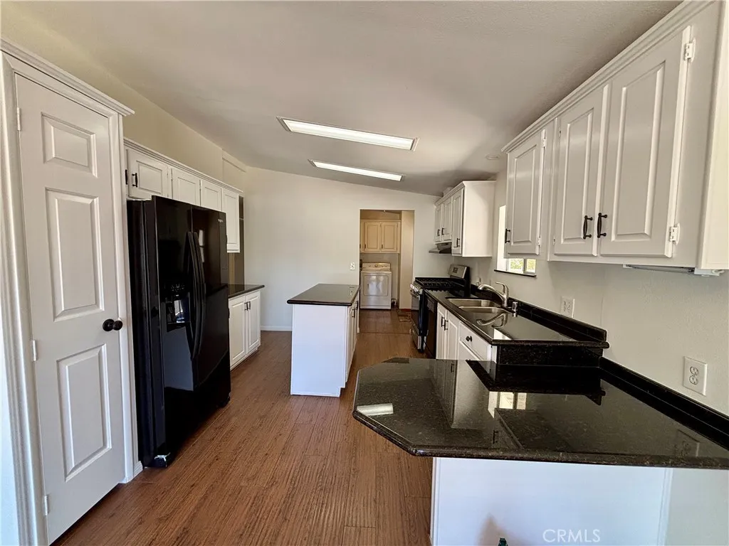 Cook's kitchen with center island and pantry