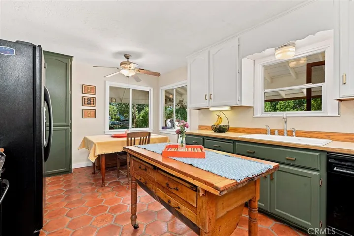 Farmhouse kitchen with new hand thrown Saltillo tile