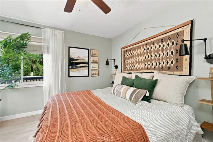 Main floor bedroom has new solid wood flooring
