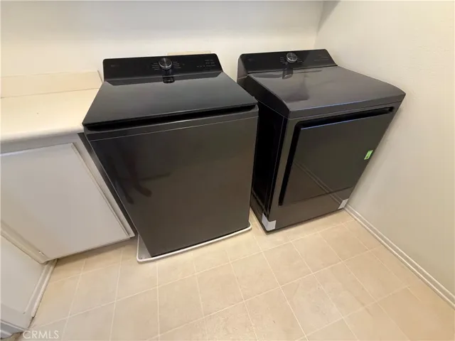 Laundry washer and dryer included. Less than 6 months old.
