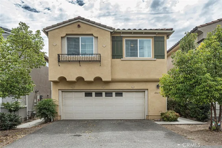 Big driveway with attached garage