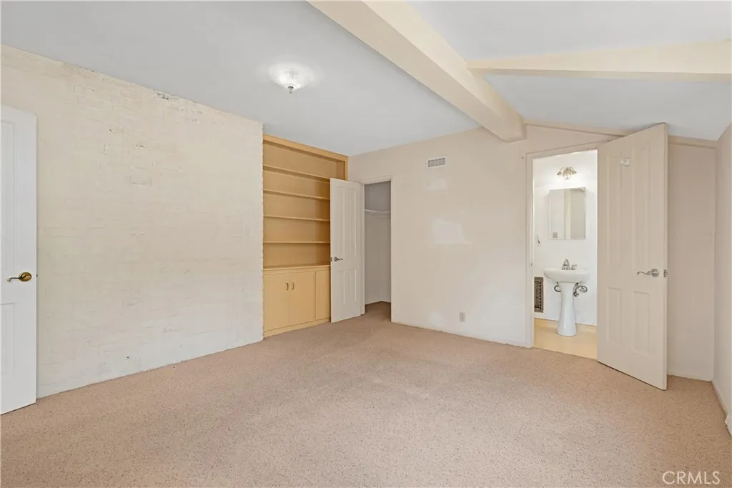 FRONT BEDROOM W/CLOSET & BUILT INS