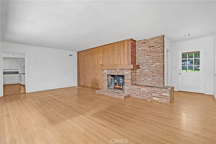 LIVING ROOM, FRONT ENTRY HALLWAY, KITCHEN & DINIG ROOM