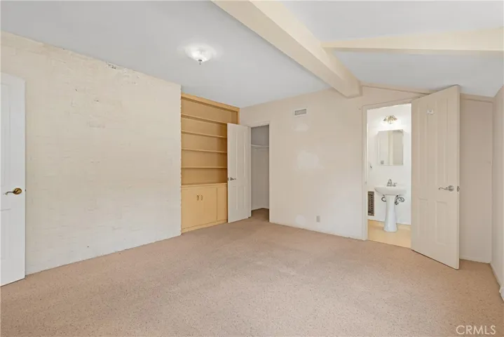 FRONT BEDROOM W/CLOSET & BUILT INS