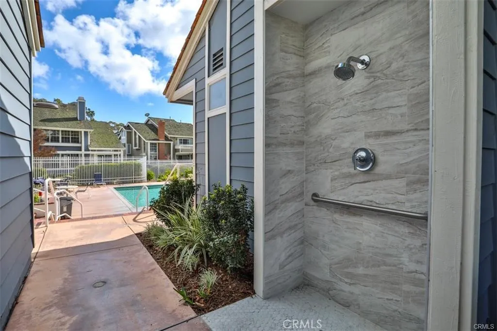 SHOWERS AT EACH POOL