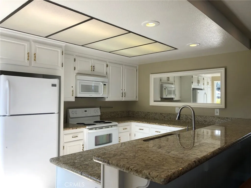 FULL KITCHEN IN THE CLUBHOUSE