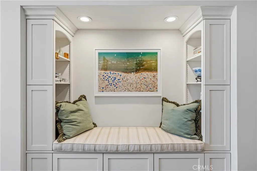 WET BAR REPLACED WITH SITTING BENCH & DISPLAY SHELVES