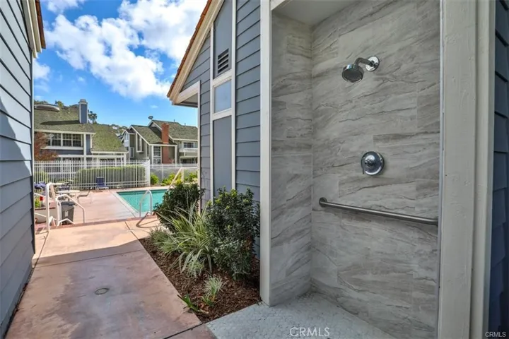 SHOWERS AT EACH POOL