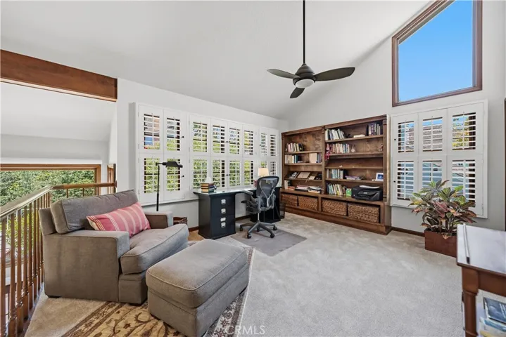 UPPER LOFT WITH ADDED CEILING FAN, BUILT-IN BOOKSHELVES