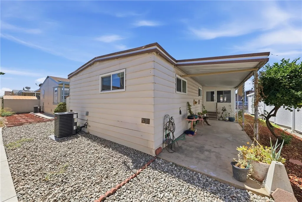 The rear of the home features a low-maintenance yard and a brand-new A/C compressor installed April, 2026.