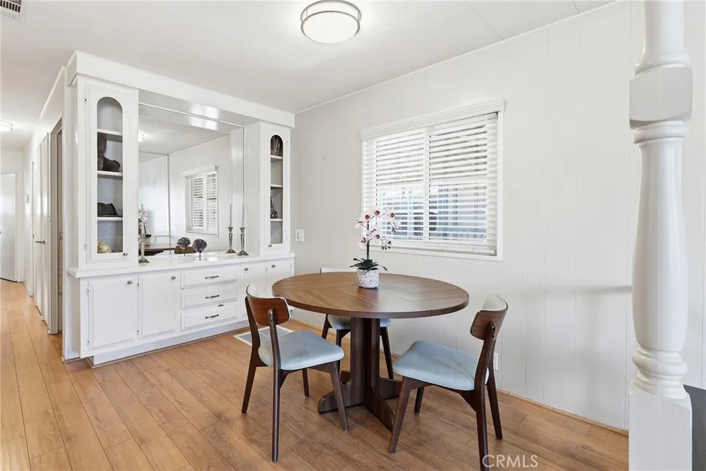 Spacious dining area with ample seating and an abundance of natural light.