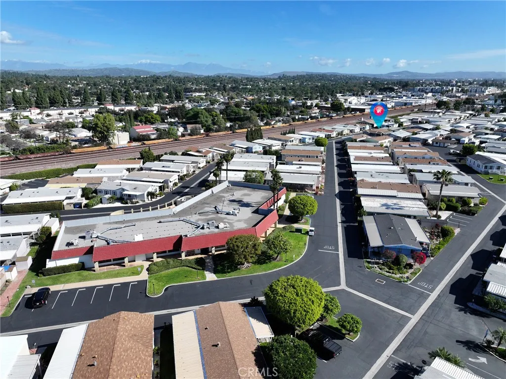 The home is just steps from the clubhouse and pool, offering a prime location within the community.